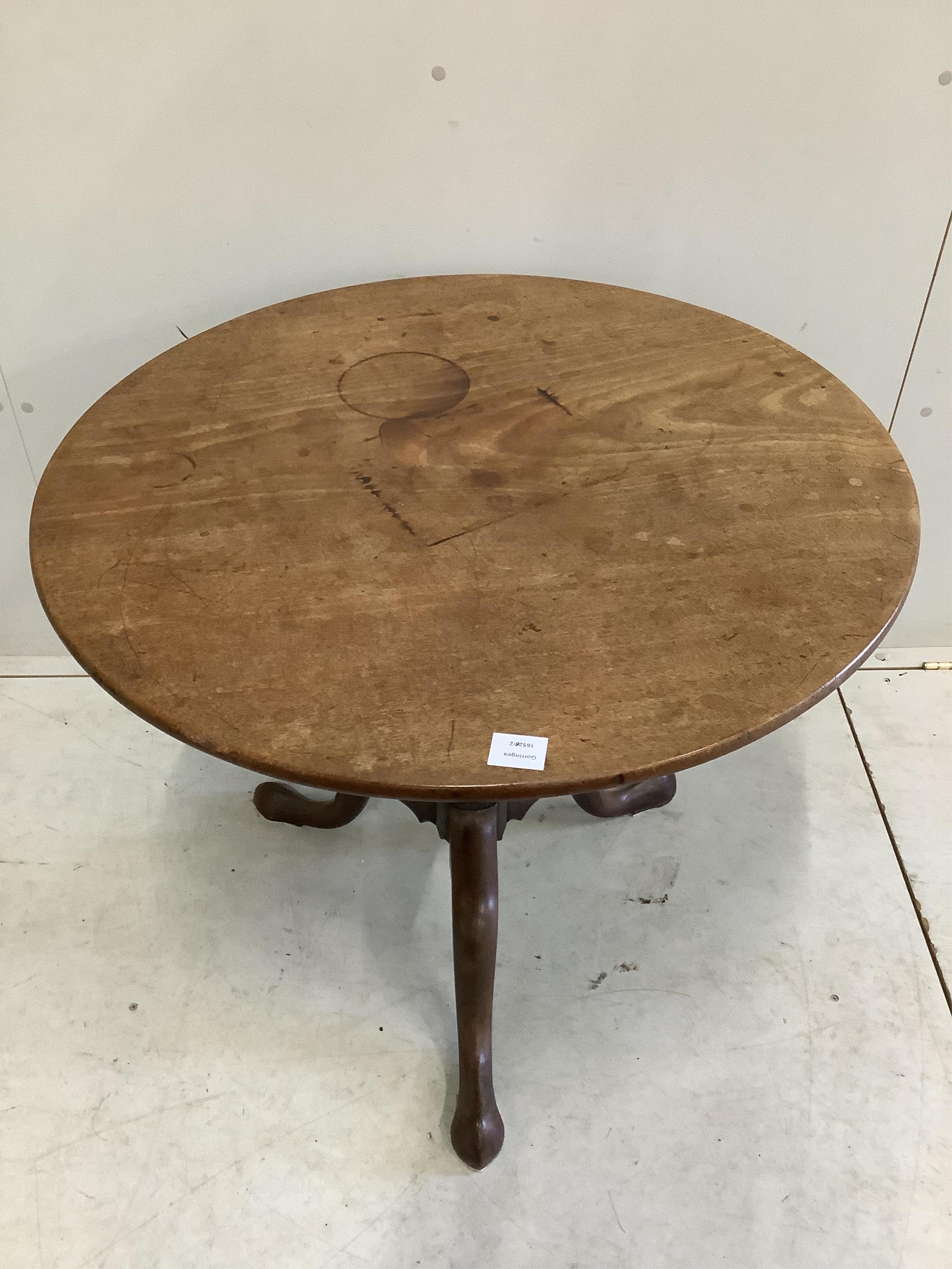 A George III mahogany circular tilt top tea table, diameter 80cm, height 68cm. Condition - poor to fair